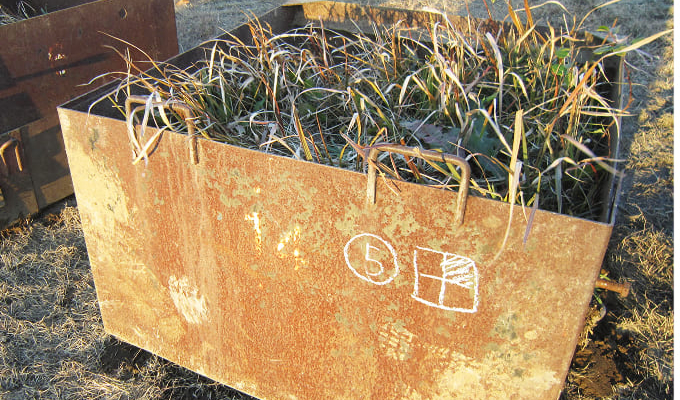 コンテナから滑り下ろすように定置